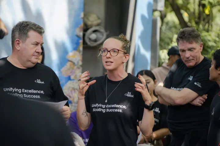 MS Capital volunteers listening during an ocean cleanup briefing in Bali